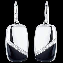 <a href=http://argent.edenly.com/boucles-d-orelles-pendantes-argent/boucles-oreilles-sixty,6002,2024.html?liste_cat=2024 style=color:#fff;text-decoration:none;><u>Boucles d'oreilles Sixty 1</u><br><br><strike>160 €</strike> (-31%) <b style=color:#FF9999;>110 €</b></a>