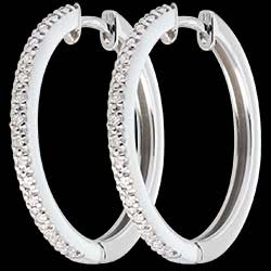 <a href=http://it.edenly.com/orecchini-cerchio-oro-diamanti/orecchini-cerchio-semi-pave-oro-bianco-32-diamanti,202,23.html?url=orecchini-cerchio-oro-diamanti&liste_cat=23 style=color:#fff;text-decoration:none;>Orecchini a cerchio semi pav� oro bianco  - 32 diamanti <br><b style=color:#FFE492;>550 €</b> (-44%) </a>