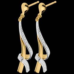 <a href=http://www.edenly.com/boucles-oreilles-pendantes/boules-d-oreilles-nouees-or-jaune-pavee,1293,24.html?liste_cat=20X22X24X23X38 style=color:#fff;text-decoration:none;><u>Boucles d'oreilles nou�es or jaune pav�es</u><br><br><b>570 €</b></a>