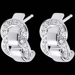<a href=http://es.edenly.com/pendientes-aros-oro-diamantes/pendientes-cierre-oro-blanco-empedrados-23-quilates-38-diamantes,221,23.html?url=pendientes&liste_cat=20X22X24X23X38X44 style=color:#fff;text-decoration:none;>Pendientes cierre oro blanco empedrados - 0.23 quilates - 38 diamantes <br><b style=color:#FFE492;>690 €</b> (-44%) </a>