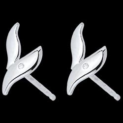 <a href=http://argent.edenly.com/boucles-d-oreilles-puces-argent/boucles-oreilles-puces-feufollet-argent-diamant,6129,2022.html?liste_cat=2020X2022X2024X2023 style=color:#fff;text-decoration:none;><u>Boucles d'oreilles puces Feufollet - Argent Diamant</u><br><br><strike>100 €</strike> (-30%) <b style=color:#FF9999;>70 €</b></a>
