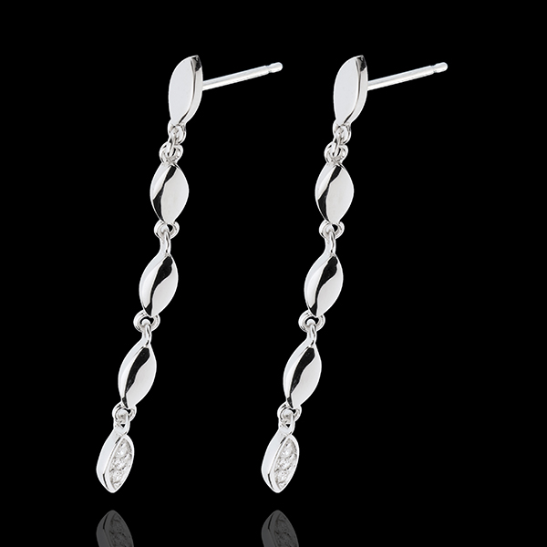 Boucles d'oreilles douce flore or blanc 18 carats.